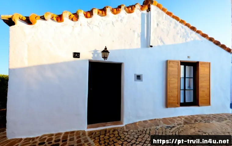 전통주택과 열화학적 관리 - Photorealistic Portuguese traditional whitewashed stone cottage with terracotta roof, thick walls an...